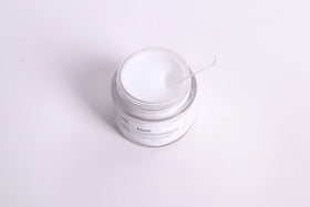 DearKlairs applied during nighttime routine on hand showing hydrated, glowing skin