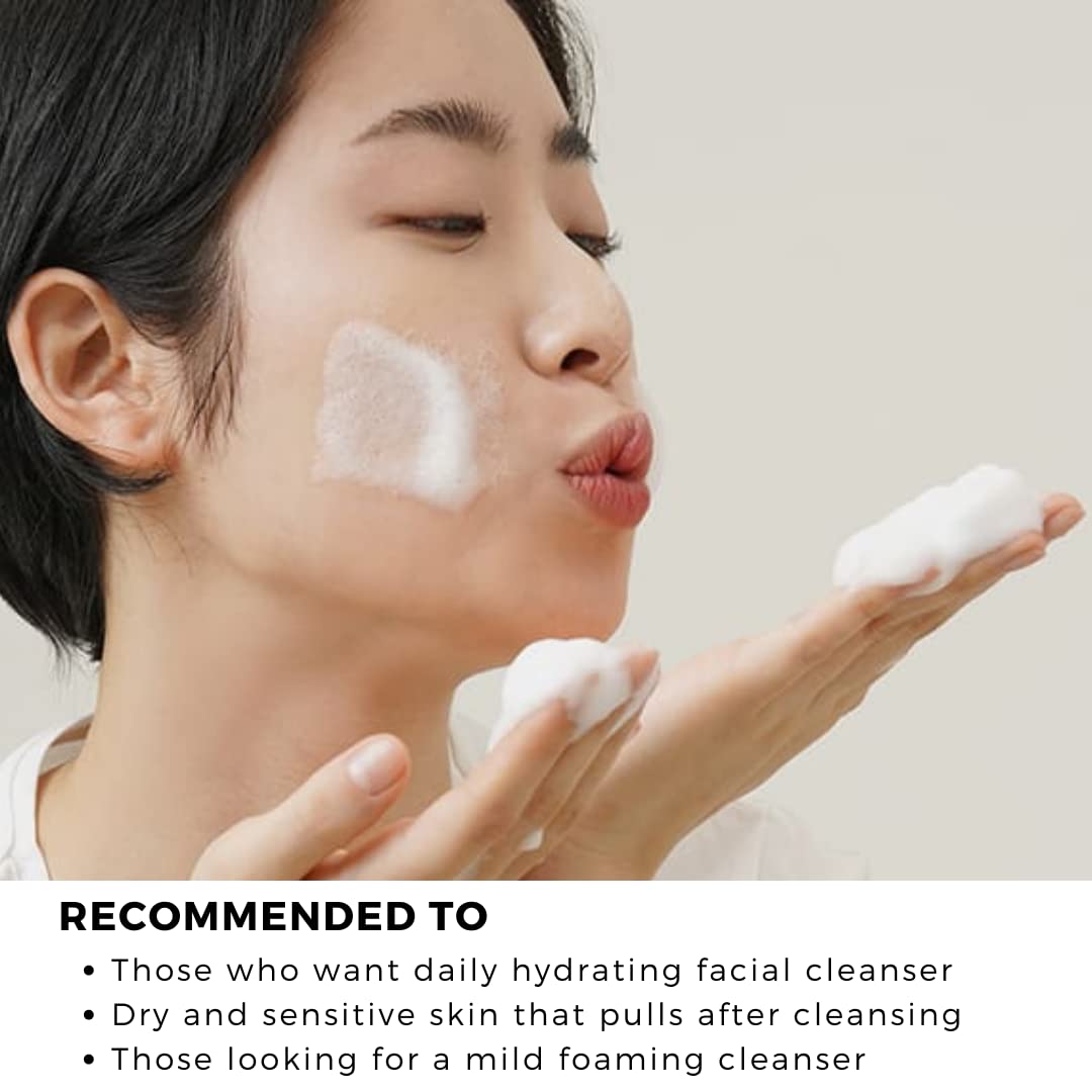 DearKlairs cleanser held in hand to show 100 ml size for travel-friendly benefit