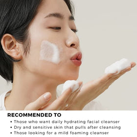 DearKlairs cleanser held in hand to show 100 ml size for travel-friendly benefit