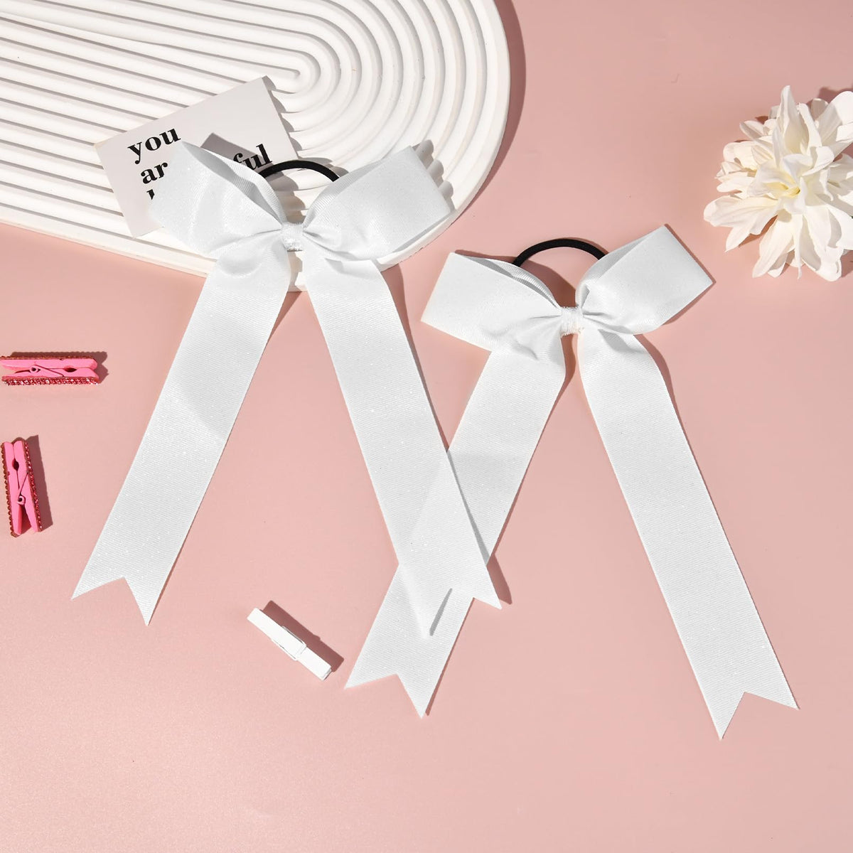 DEEKA stacked twelve bows laid out highlighting uniform appearance for teams