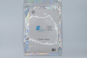 Deep Dish Wave patch next to a ruler showing compact size and fit