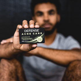 Defense Soap next to ruler showing 4.2oz size for accurate scale