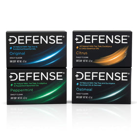Defense Soap front packaging showing four full-size bars and brand clarity