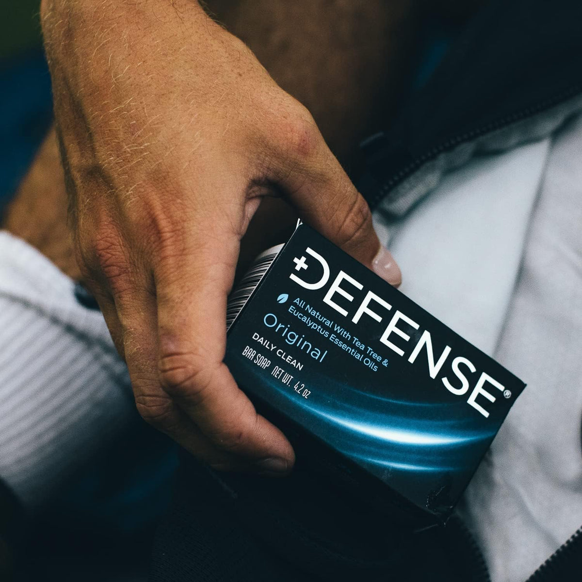Defense Soap with tea tree and eucalyptus bottles showing natural ingredient focus and fresh scent