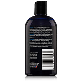 Defense Soap pouring texture showing creamy moisturizing consistency