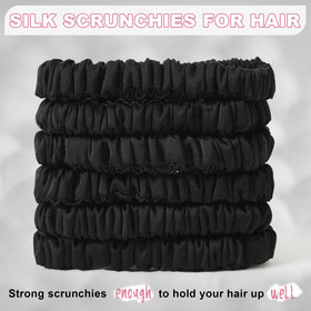 DEMAZALO scrunchie held in a hand for scale shows compact size and portability