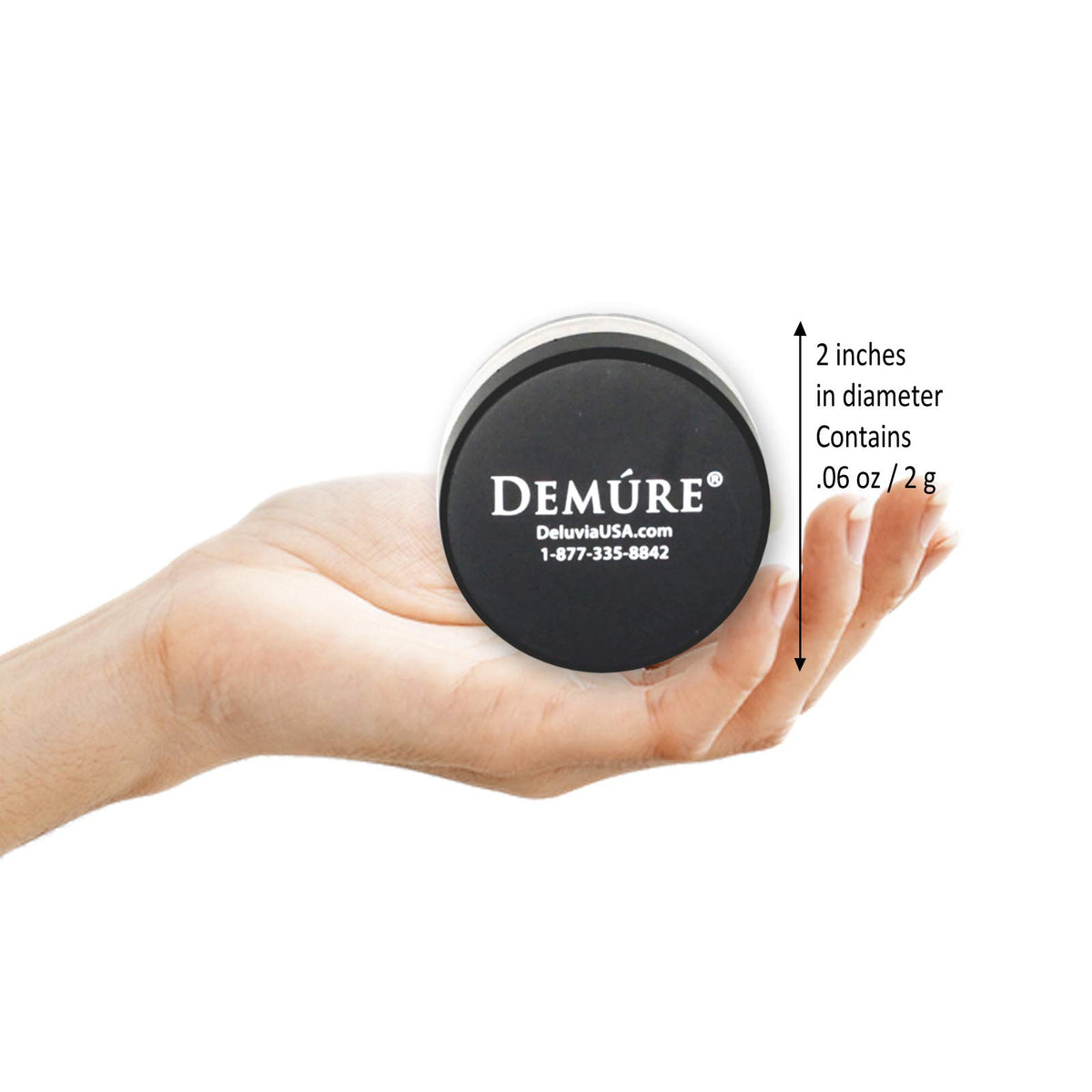 DEMÚRE size comparison next to coin showing compact, travel-friendly benefit