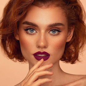 Depuplum texture swipe of magenta showing rich pigment and smooth matte payoff