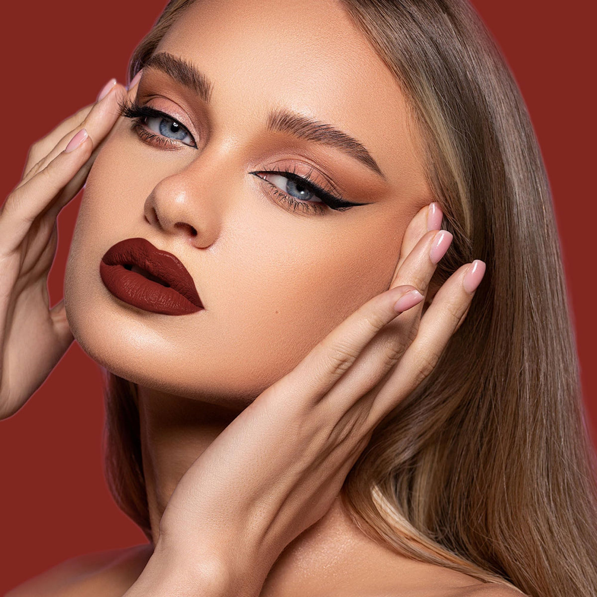 depuplum swatch on arm rich oxblood red pigment that stays intense
