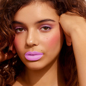 Depuplum worn on model in daylight for natural soft pink look and durability