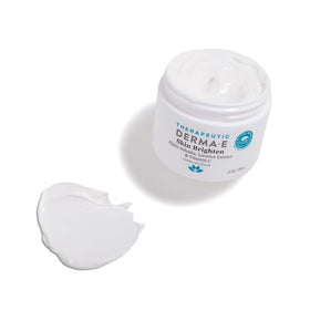 Derma E applied to cheek demonstrating targeted brightening benefit
