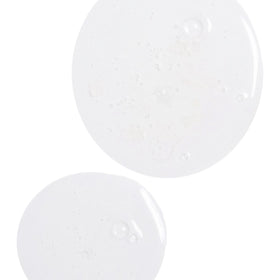 Derma E bottle styled on bathroom shelf conveying everyday clean-beauty routine