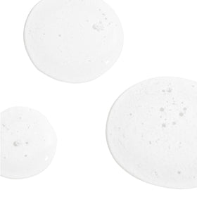 Derma E ingredients label closeup highlighting glycolic acid and vitamin A benefits