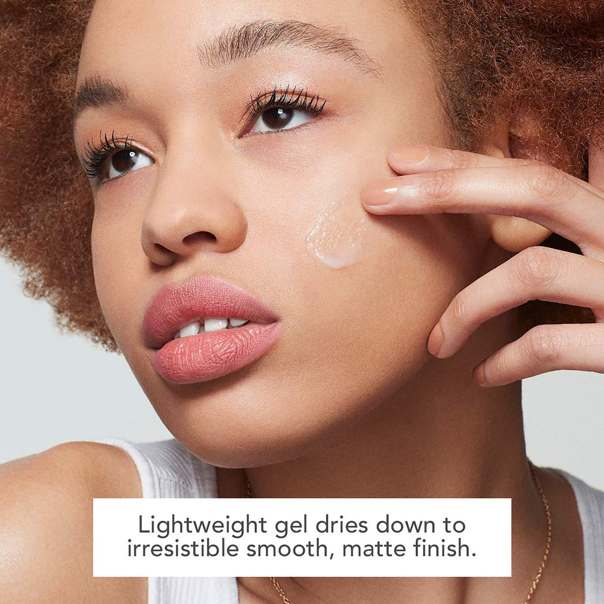 Dermablend primer applied on cheek showing smooth, matte finish benefit