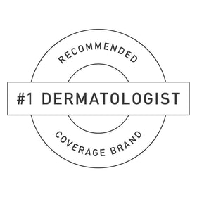 Dermablend stick being applied under eye for precise dark-circle coverage and brightening