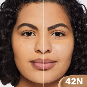 Dermablend applying under eye to reduce dark circles