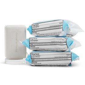 Dermaharmony front packaging showing three 4 oz therapeutic soap bars, clear product benefit display