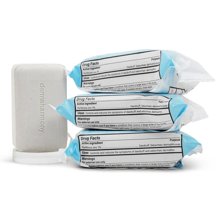 Dermaharmony front packaging showing three 4 oz therapeutic soap bars, clear product benefit display