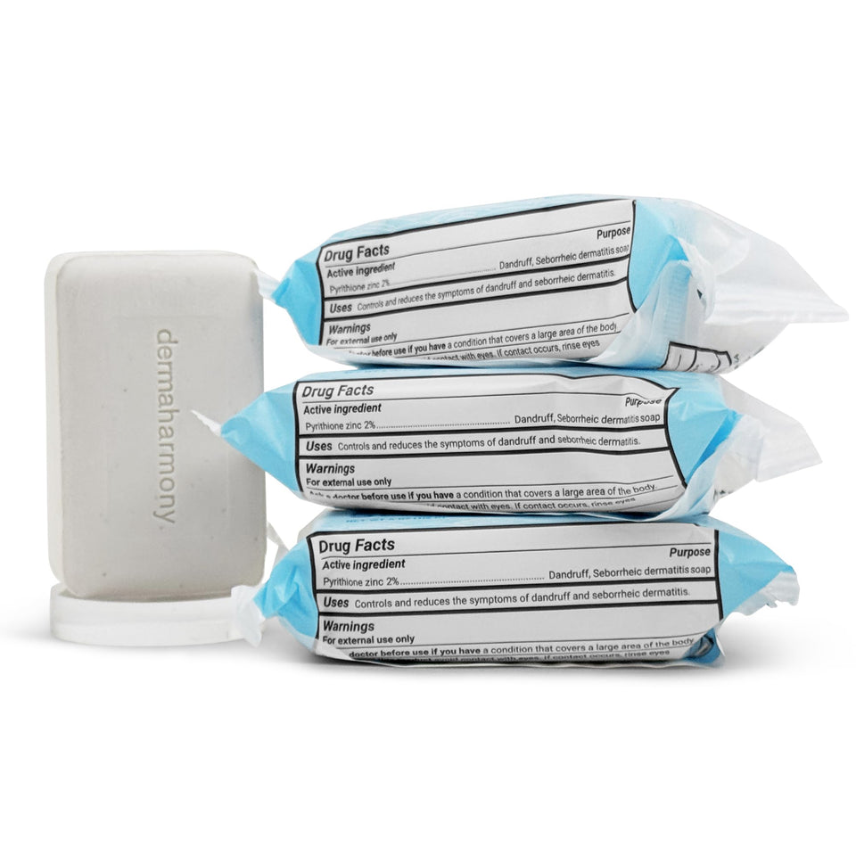 Dermaharmony front packaging showing three 4 oz therapeutic soap bars, clear product benefit display