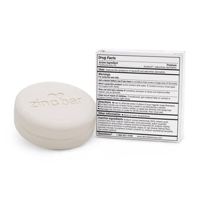 Dermaharmony product label close-up showing 2% pyrithione zinc clarity and trust