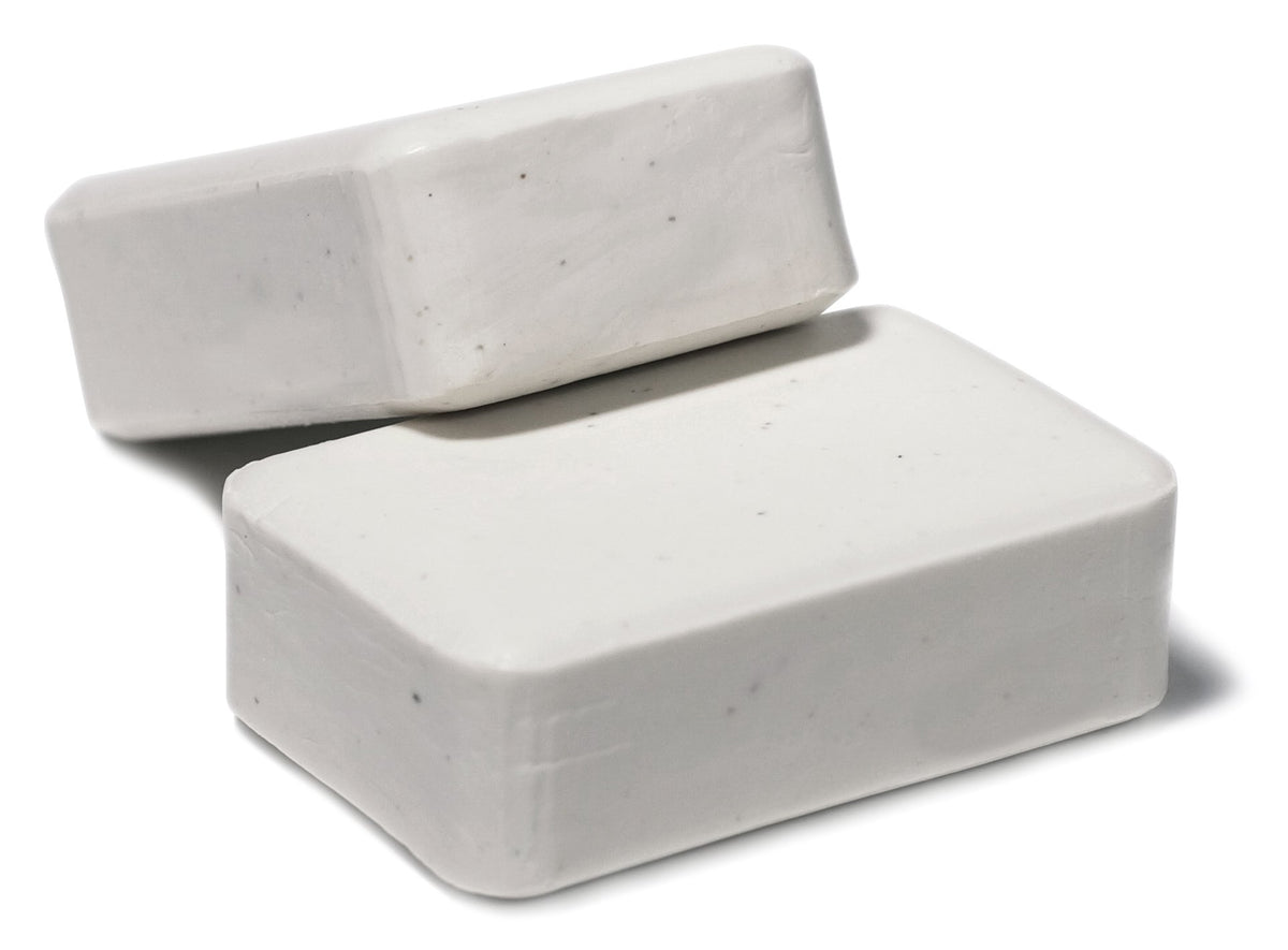 Dermaharmony bars on bathroom counter in minimalist setting conveying daily routine ease