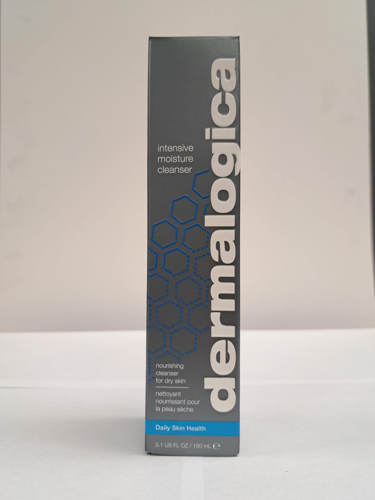 Dermalogica cleanser rinsing with water highlighting easy removal