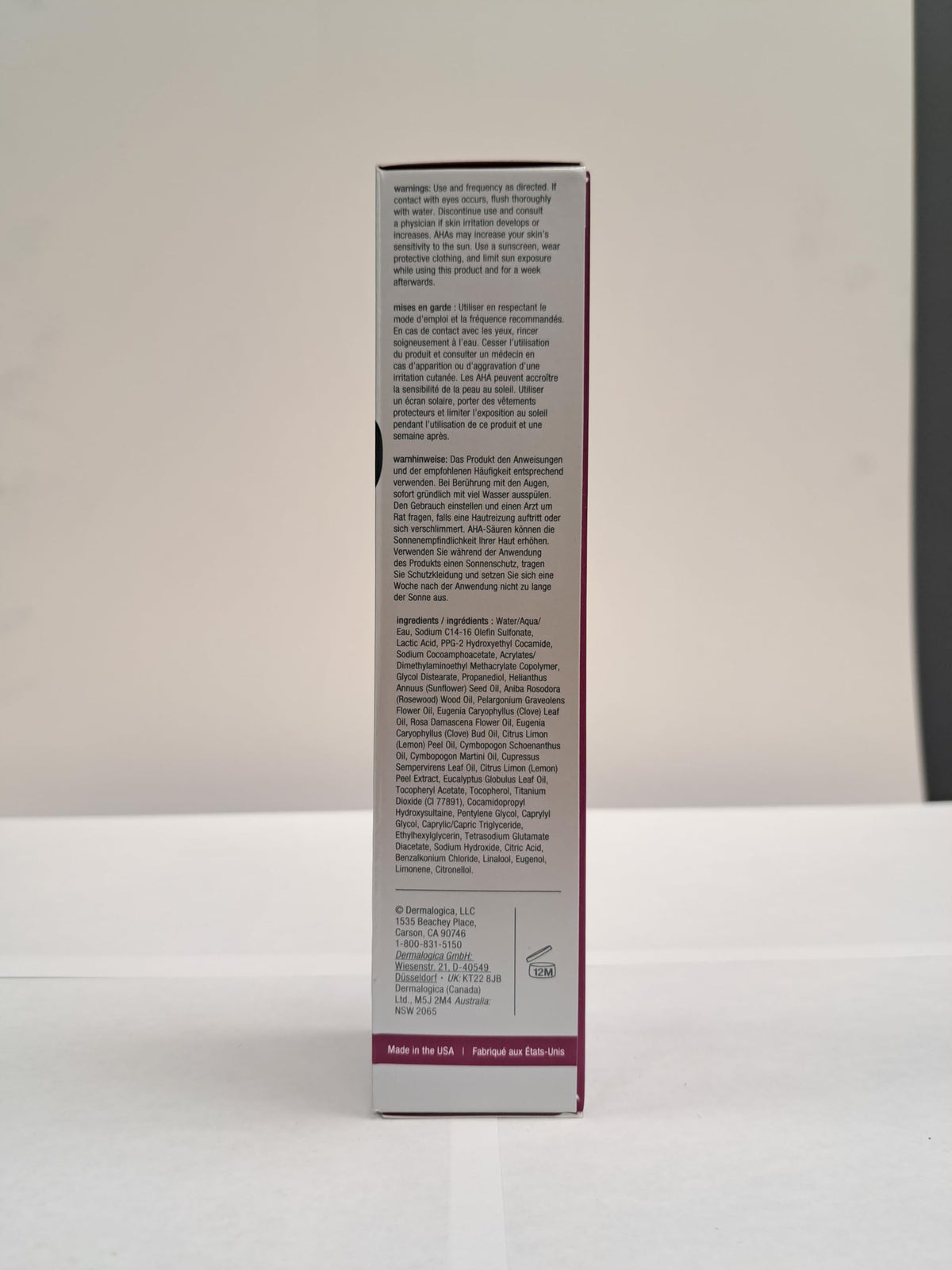 Dermalogica compact pouch in travel bag suggesting portability and on-the-go use