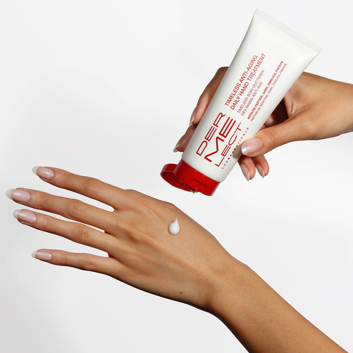 Dermelect cream texture close-up highlighting peptides and hyaluronic smoothness benefit