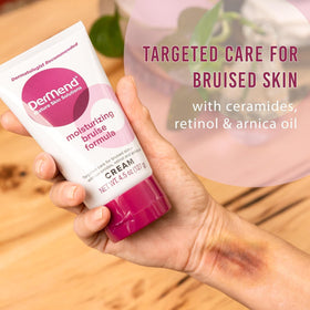 Dermend cream texture on fingertip illustrating fast-absorbing, lightweight feel