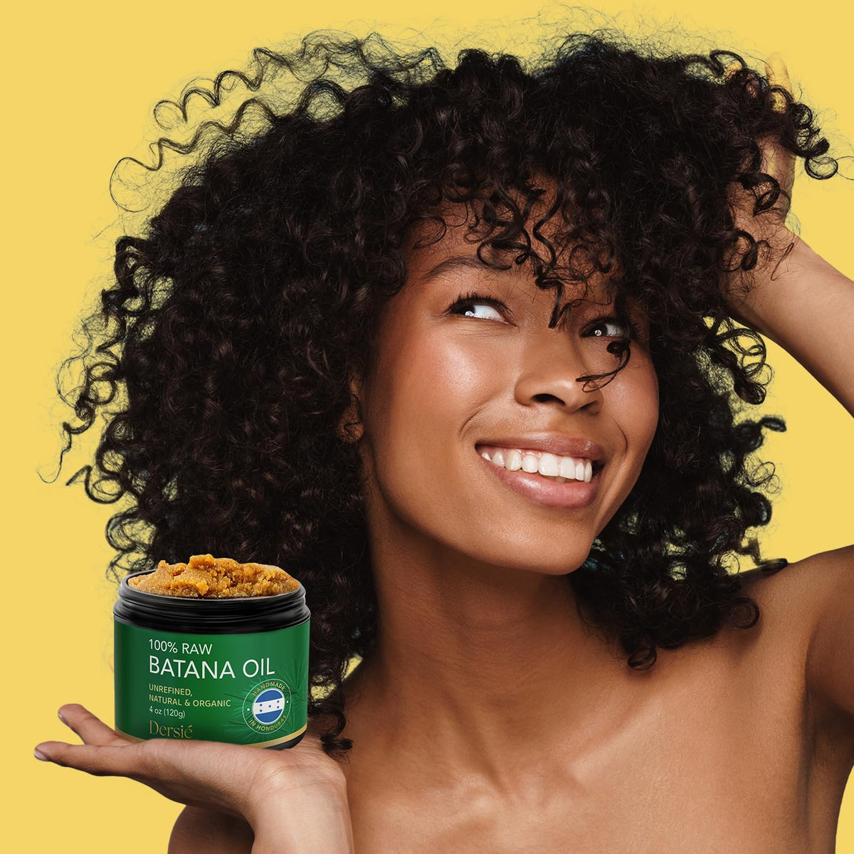 Close-up of Dersie batana butter texture revealing rich paste and moisturizing benefit