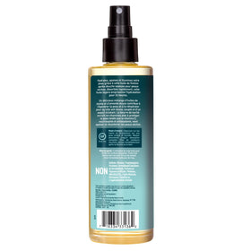 Desert Essence bottle staged on bathroom shelf for daily routine inspiration