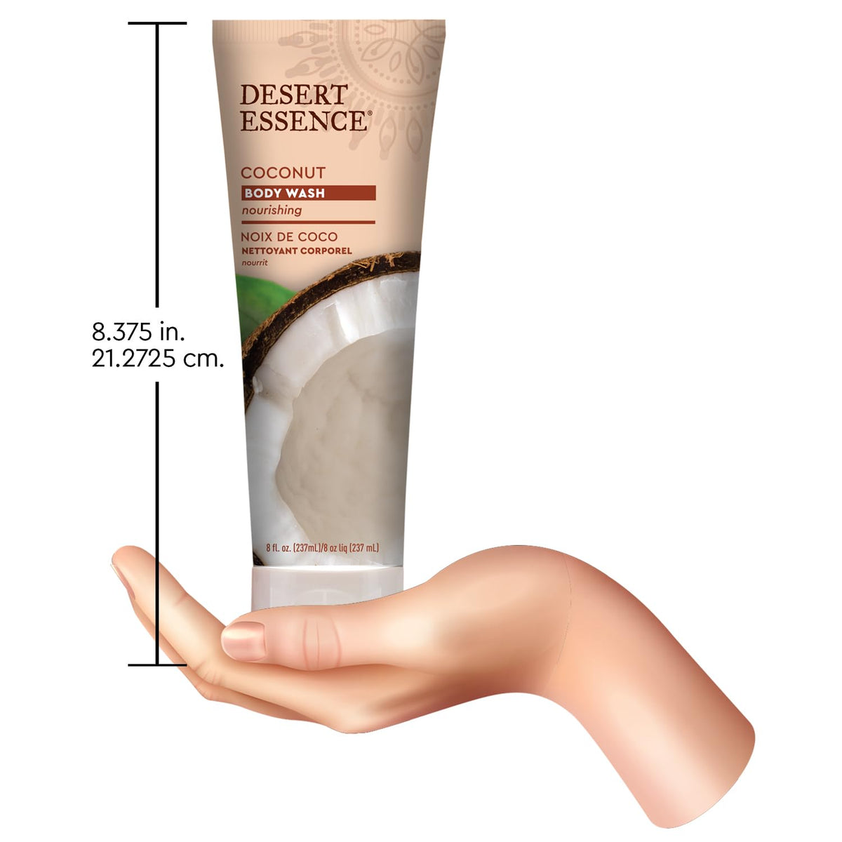 Desert Essence bottle held in hand to show 8 oz travel-friendly size
