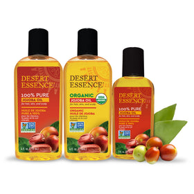 Desert Essence jojoba oil on bathroom shelf styled in a skincare routine setting