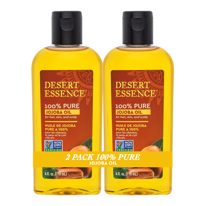 Desert Essence jojoba oil front bottle showing label and clear golden oil