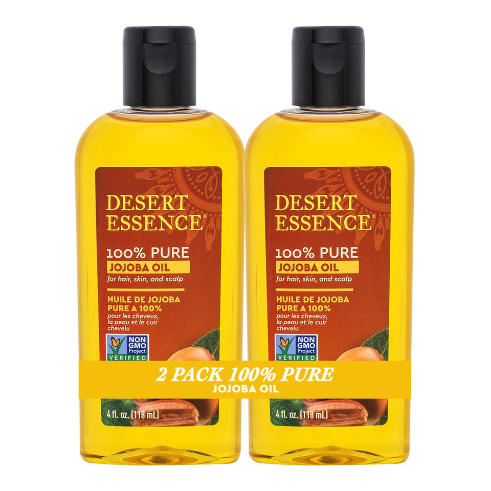 Desert Essence jojoba oil front bottle showing label and clear golden oil