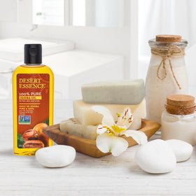 Desert Essence removing makeup on cotton pad showing gentle cleansing benefit