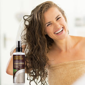 Desert Essence on bathroom counter styled with hair tools