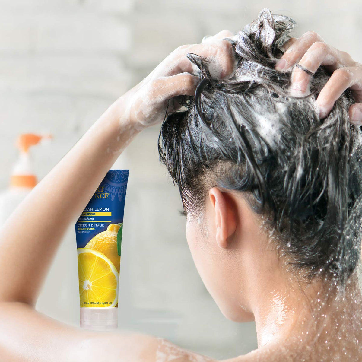 Desert Essence bottle on bathroom counter lifestyle shot showing natural routine benefit