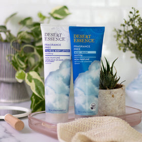 Desert Essence lotion spread on elbow illustrating targeted softening of dry skin
