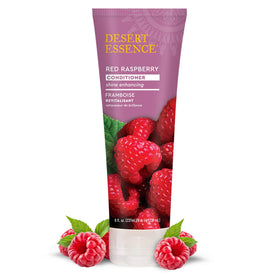 Desert Essence conditioner texture poured to show creamy consistency and shine benefit
