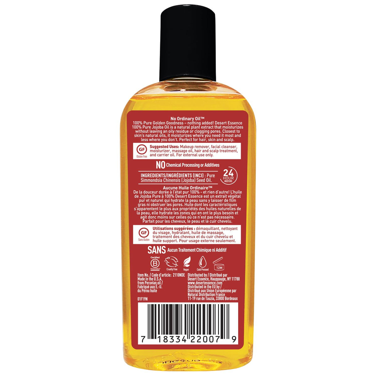 Desert Essence bottle held in hand showing 4 fl oz size and travel-friendly benefit