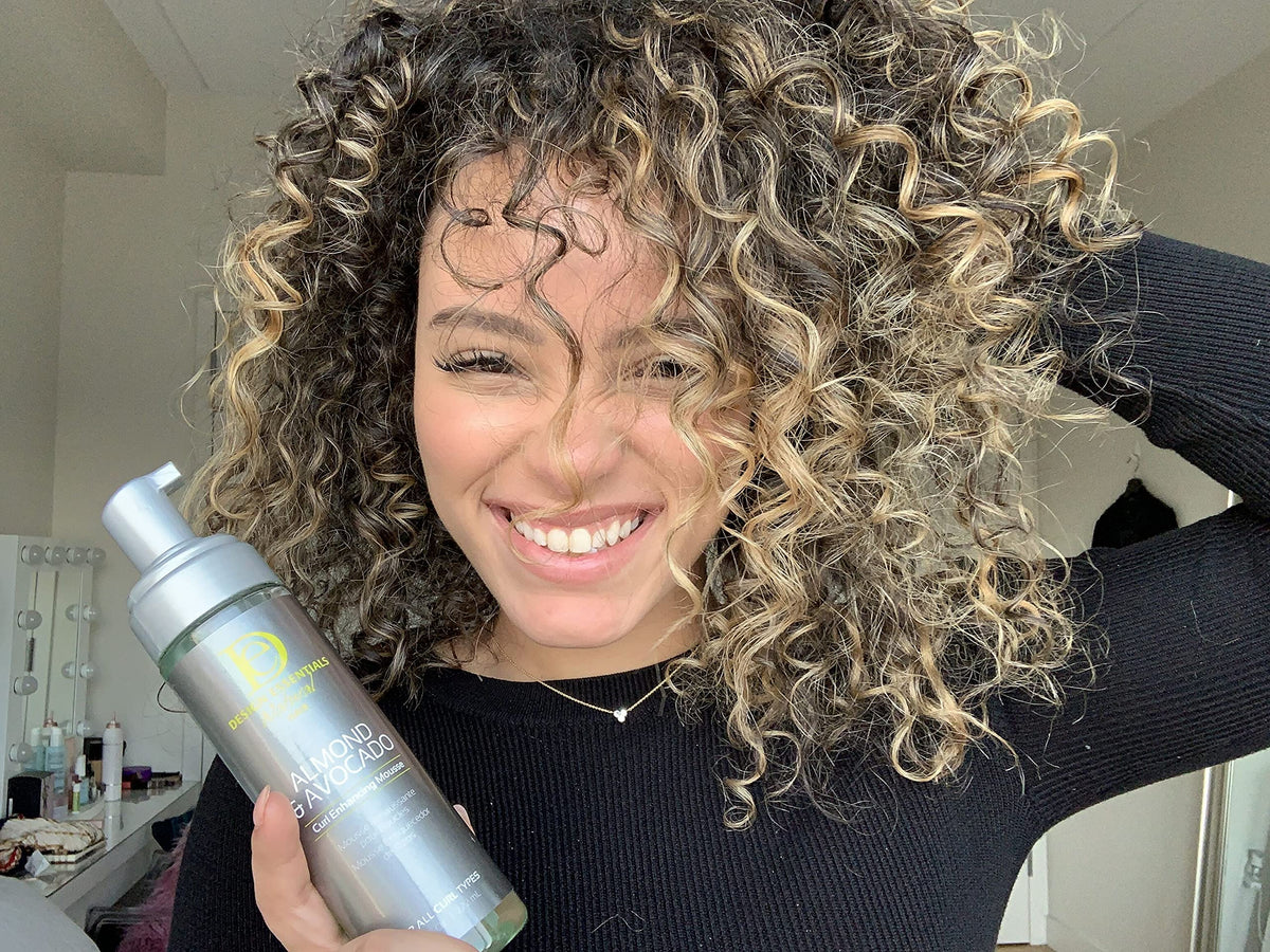 Design Essentials before and after curl comparison showing reduced frizz and more shine