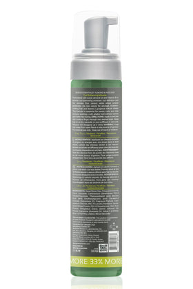 Design Essentials being scrunched into damp curls to enhance definition