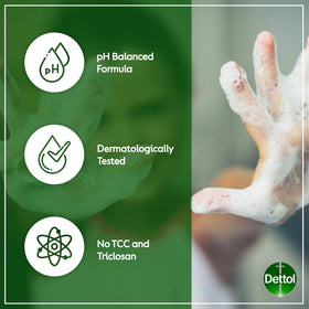 Dettol label close-up displaying pH-balanced and dermatologically tested