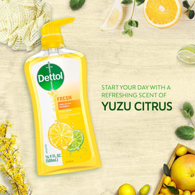 Person showering in morning enjoying Dettol fresh yuzu citrus scent