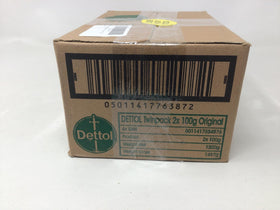 Dettol bar beside a ruler showing 100 g (3.5 oz) scale clarity