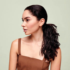 DevaCurl applied to wet curls demonstrating enhanced clumping and frizz control
