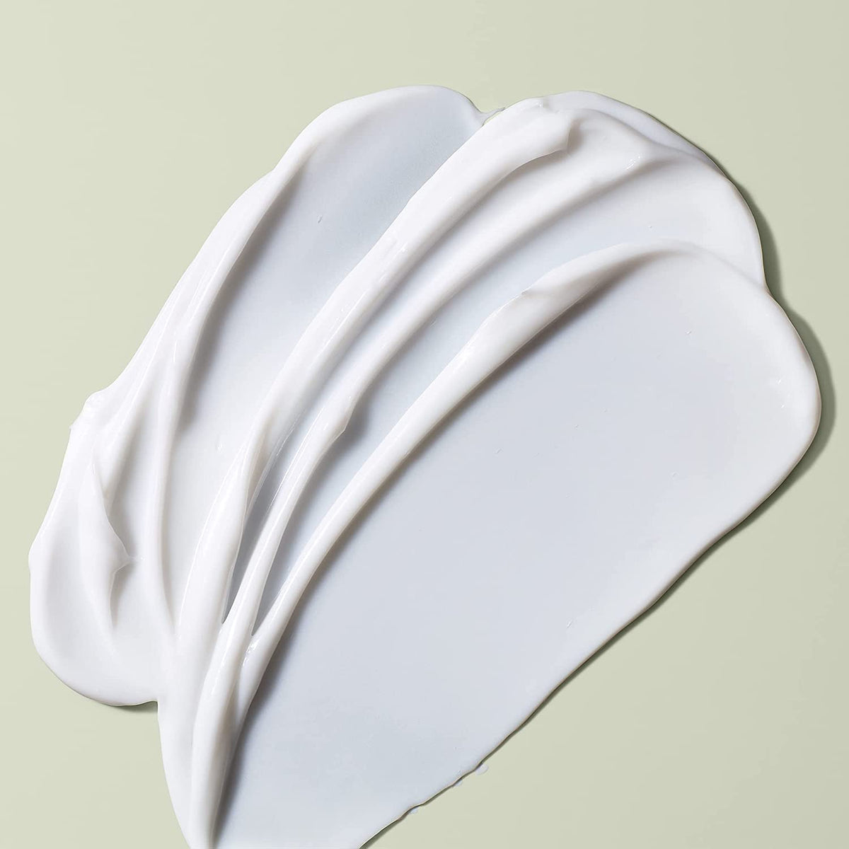 DevaCurl in-use application on wet curls for easier detangling and shape