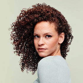 DevaCurl before and after root lift showing added body and volume