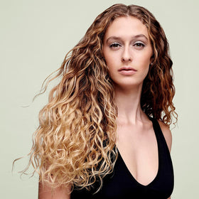 DevaCurl No-Poo creamy texture close-up demonstrating moisturizing consistency